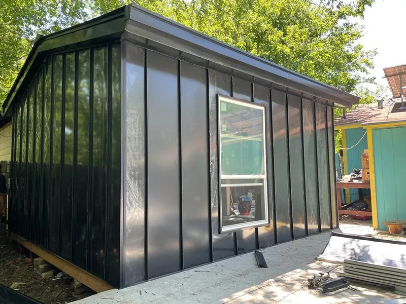 Black standing seam metal wall panels for Roof Inspection in Bath